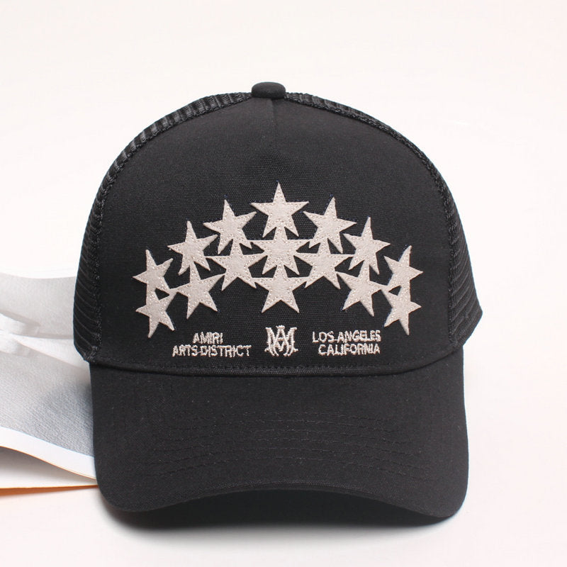 AMIRI star-patch paneled trucker cap