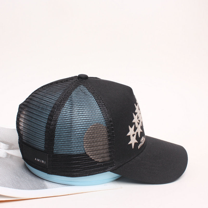 AMIRI star-patch paneled trucker cap